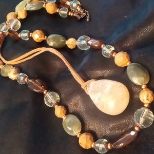 Agate stone pendant on a soft leather & Loft simulated crystal cut agate